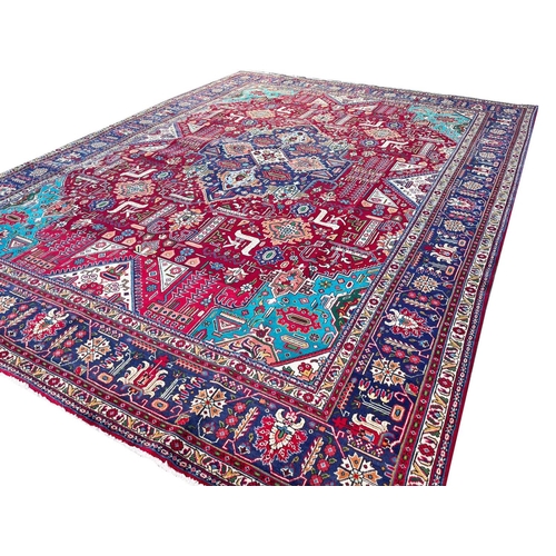 195 - PERSIAN TABRIZ CARPET, 390cm x 292cm.