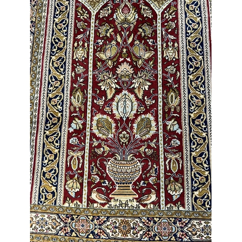 224 - PERSIAN RUG, 167cm x 105cm, together with a bokhara rug, 160cm x 115cm. (2)