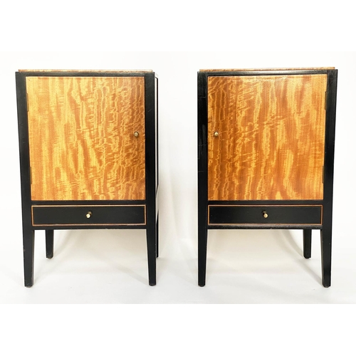 239 - BEDSIDE CABINETS, a pair, 1960s satinwood and ebonised each with panelled door and drawer by 'Loughb... 