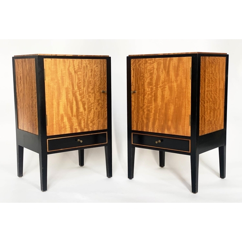 239 - BEDSIDE CABINETS, a pair, 1960s satinwood and ebonised each with panelled door and drawer by 'Loughb... 