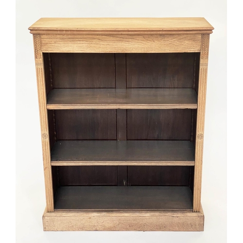 87 - OPEN BOOKCASE, late 19th century oak and carved with three adjustable shelves, 87cm W x 112cm H x 30... 