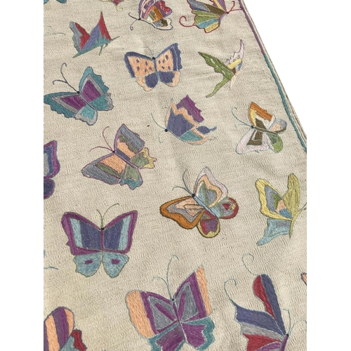 218 - FINE SUZANI BUTTERFLY KILIM, 237cm x 179cm.