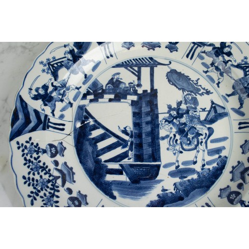 1 - CHINESE CHARGER, Kangxi style blue and white ceramic decorated with swordsmen a saddled warrior and ... 