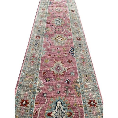 212 - CONTEMPORARY OUSHAK RUNNER, 393cm x 79cm.