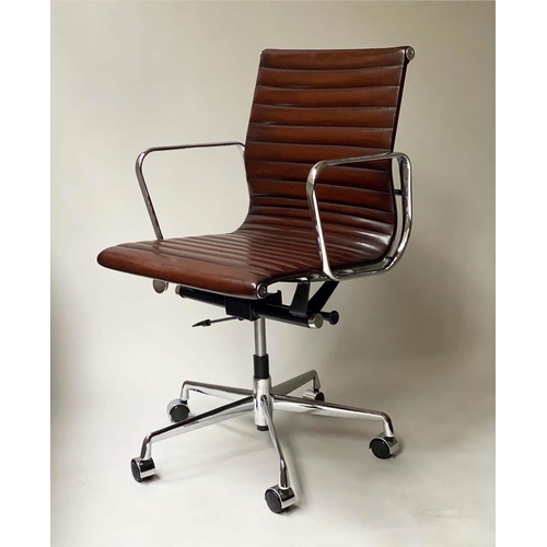 105 - REVOLVING DESK CHAIR, Charles and Ray Eames inspired with ribbed mid brown leather, revolving and re... 