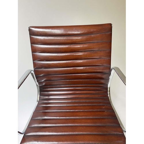 105 - REVOLVING DESK CHAIR, Charles and Ray Eames inspired with ribbed mid brown leather, revolving and re... 