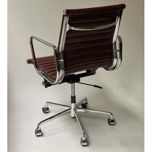 105 - REVOLVING DESK CHAIR, Charles and Ray Eames inspired with ribbed mid brown leather, revolving and re... 