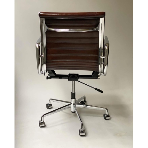 105 - REVOLVING DESK CHAIR, Charles and Ray Eames inspired with ribbed mid brown leather, revolving and re... 