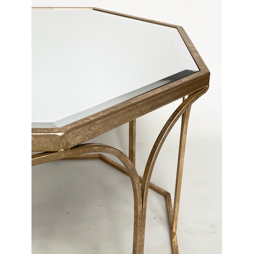 368 - LOW TABLE, octagonal mirror glazed with gilt metal supports, 80cm W x 50cm H.