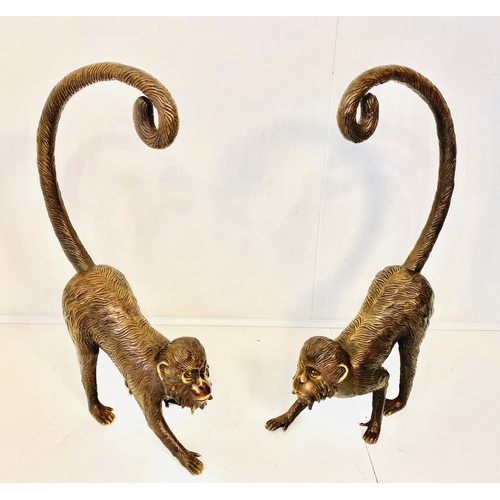 393 - SCULPTURAL MONKEY FIGURES, a pair, 80cm H, bronzed finish. (2)