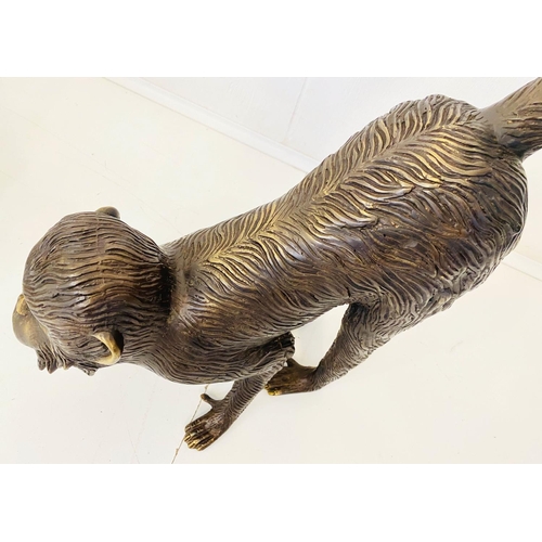 393 - SCULPTURAL MONKEY FIGURES, a pair, 80cm H, bronzed finish. (2)