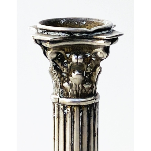 198 - CANDLESTICKS, a pair, 19th century silvered Corinthian capped, reeded column, wreath stepped weighte... 