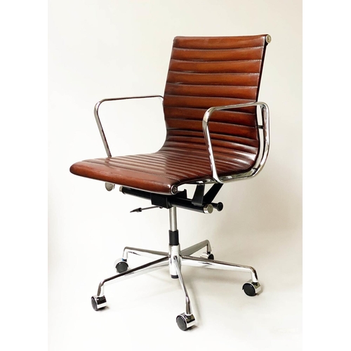 182 - REVOLVING DESK CHAIR, Charles and Ray Eames inspired with ribbed tan leather seat revolving and recl... 