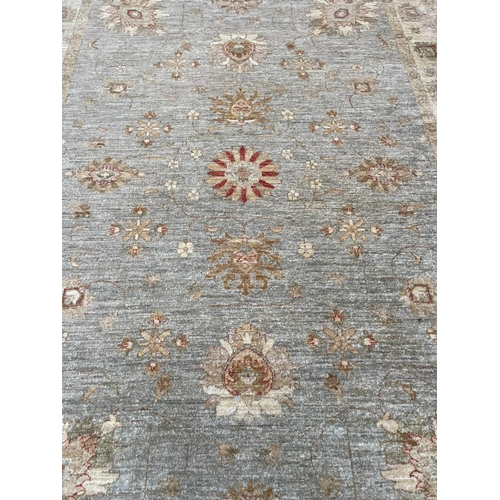 63 - ZEIGLER CARPET, 290cm x 203cm.