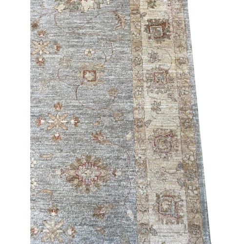 63 - ZEIGLER CARPET, 290cm x 203cm.