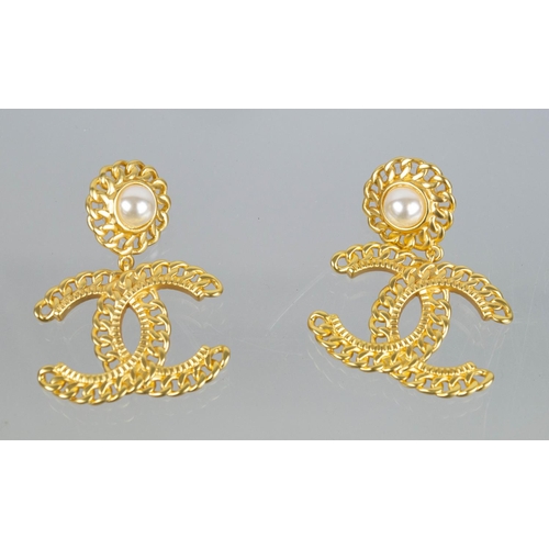 11 - CHANEL CC LOGO EARRINGS, a pair, along with a pair of star and CC logo dangle earrings and a pair of... 