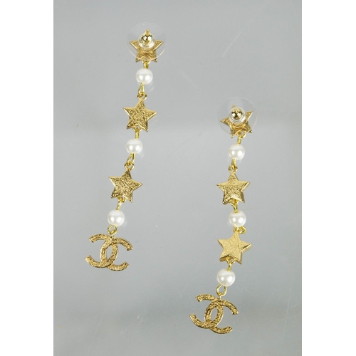 11 - CHANEL CC LOGO EARRINGS, a pair, along with a pair of star and CC logo dangle earrings and a pair of... 