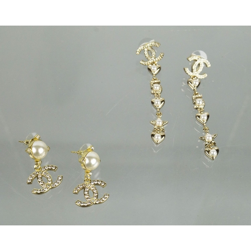 12 - CHANEL LONG FAUX PEARL CC NECKLACE with a pair of CC earrings and heart dangle earrings. (3)