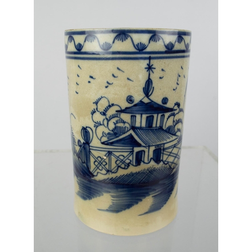 20 - TANKARD, chinoiserie blue and white pagoda decoration, 15cm H.