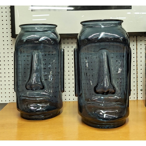 422 - RAPA NUI STYLE VASES, a pair, blue tinted glass, 35cm H. (2)