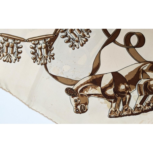 35 - VINTAGE HERMÈS 'LES CAVALIERS D'OR' SILK SCARF, designed in 1975 by Rybaltchenko, Scynthian art moti... 