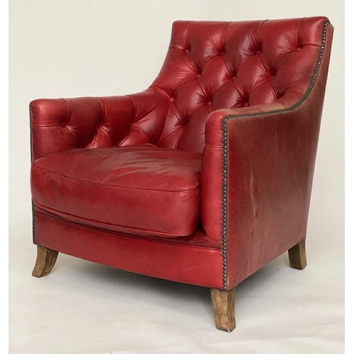 81 - ARMCHAIR AND STOOL, club style antique aged and brass studded scarlet leather upholstered with butto... 