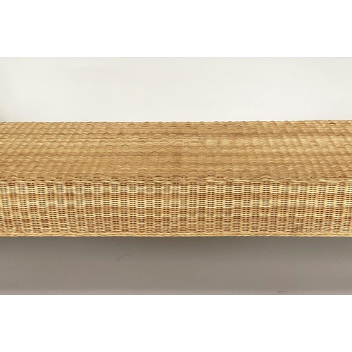 84 - WINDOW SEAT, rectangular cane woven with outswept arms and tapering square section supports, 148cm W... 