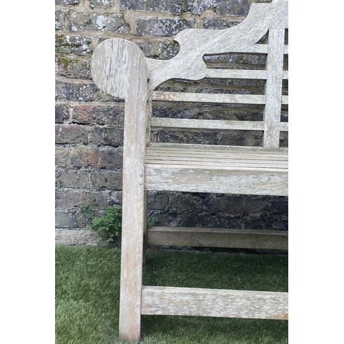 97 - LUTYENS STYLE GARDEN BENCH, weathered teak of slatted constructions after a design by Sir Edwin Luty... 