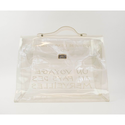 20 - HERMES KELLY TRANSPARENT BAG, souvenir from 1997 collection, flat top handle, gold tone hardware, 39... 