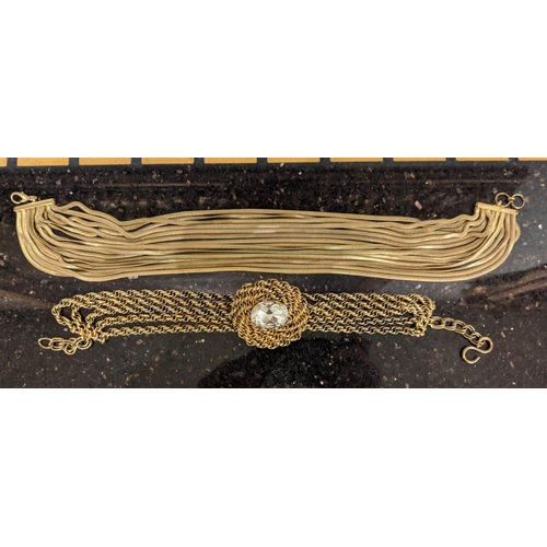 9 - HERRINGBONE SNAKE CHAIN NECKLACE, gold tone of multiple layers together with another gold tone multi... 