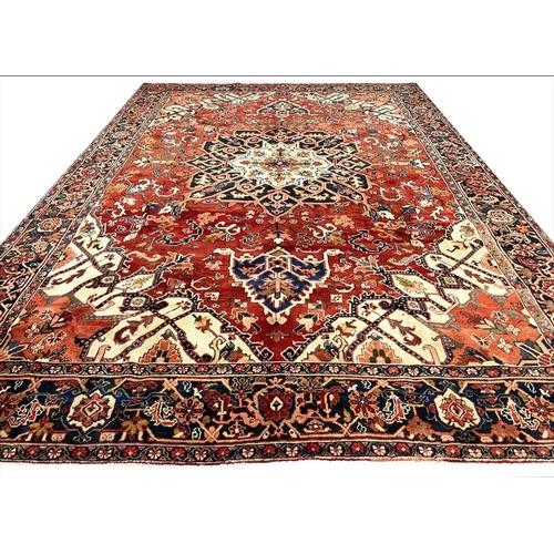 66 - ANTIQUE PERSIAN HERIZ SERAPI CARPET, 400cm x 283cm.