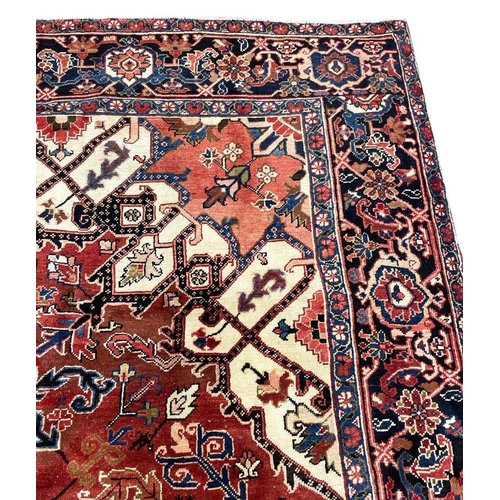 66 - ANTIQUE PERSIAN HERIZ SERAPI CARPET, 400cm x 283cm.