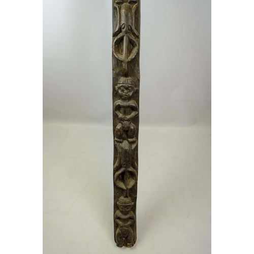 23 - AFRICAN DOOR LINTEL, with repeat figural carving, 185cm H.