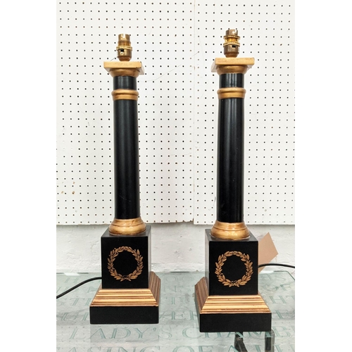 126 - TABLE LAMPS, a pair, each approx 50cm black and gilt with classical wreath motif. (2)