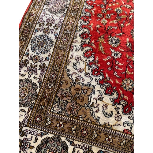 65 - PURE SILK QUM DESIGN RUG, 240cm x 150cm.