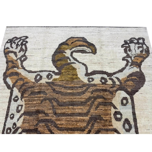 102 - TIBETAN TIGER RUG, 230cm x 170cm.