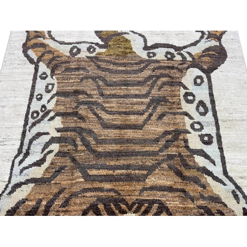 102 - TIBETAN TIGER RUG, 230cm x 170cm.