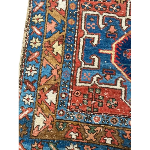 112 - ANTIQUE NORTH WEST PERSIAN RUNNER, 310cm x 95cm.