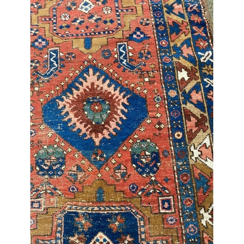 112 - ANTIQUE NORTH WEST PERSIAN RUNNER, 310cm x 95cm.