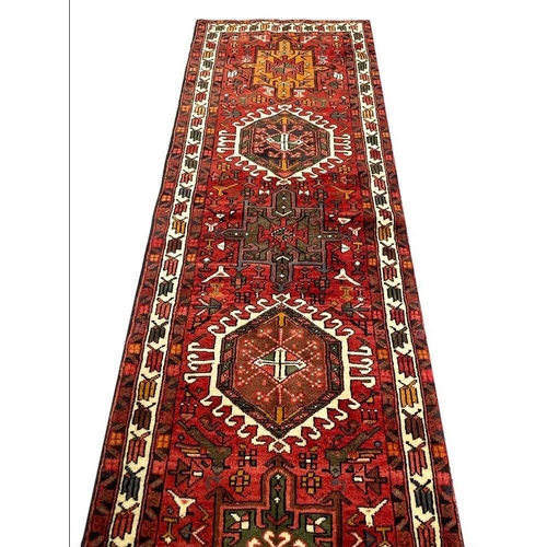 116 - PERSIAN KARAJA LONG RUNNER, 407cm x 75cm.