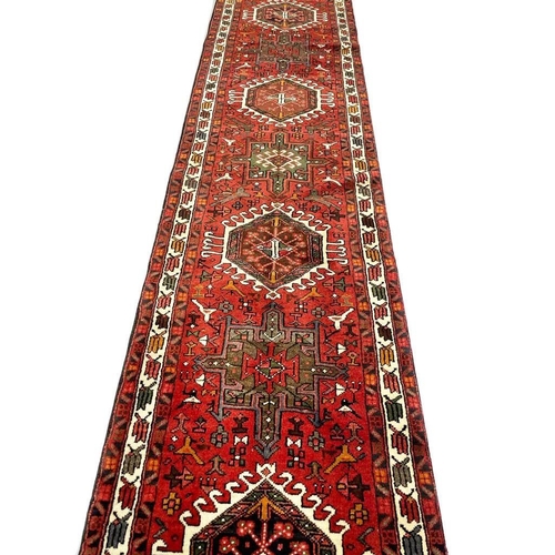 116 - PERSIAN KARAJA LONG RUNNER, 407cm x 75cm.