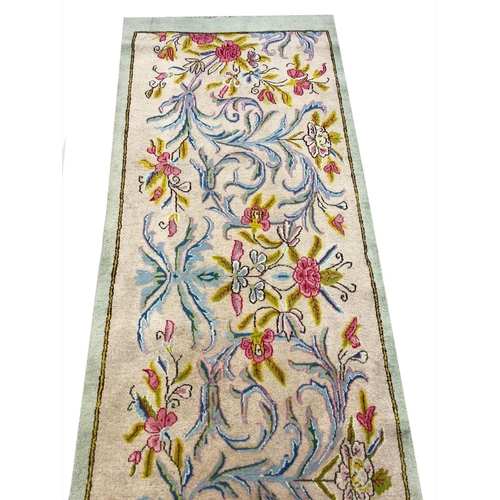 124 - PERSIAN KIRMAN RUNNER, 394cm x 83cm.