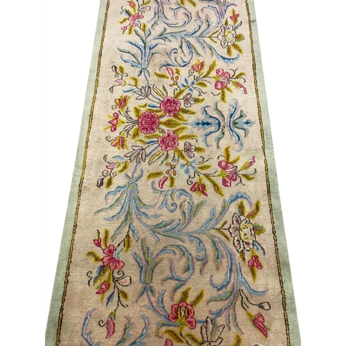 124 - PERSIAN KIRMAN RUNNER, 394cm x 83cm.