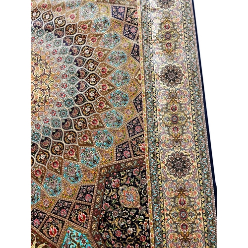 127 - FINE QUM DESIGN CARPET, 305cm x 197cm.