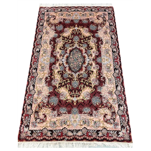 128 - FINE QUM DESIGN RUG, 183cm x 112cm.