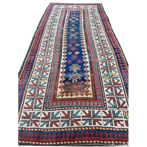 129 - CAUCASIAN KAZAK RUNNER, 254cm x 110cm.