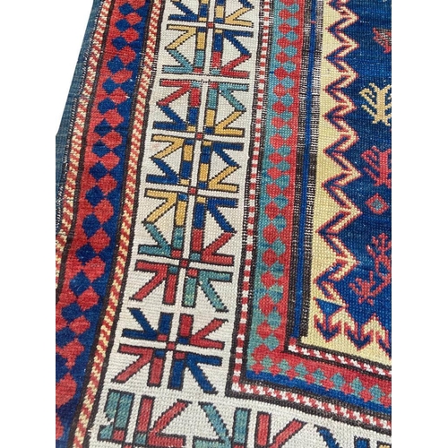 129 - CAUCASIAN KAZAK RUNNER, 254cm x 110cm.