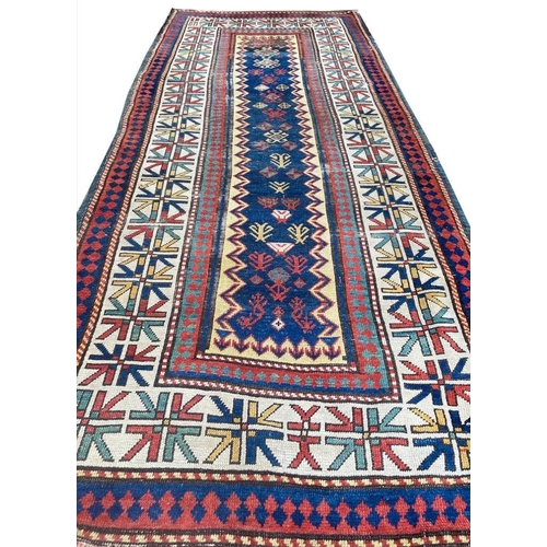 129 - CAUCASIAN KAZAK RUNNER, 254cm x 110cm.