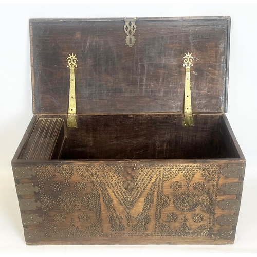 140 - ZANZIBAR TRUNK, 19th century hardwood and brass bound with rising lid, 57cm H x 116cm x 55cm.