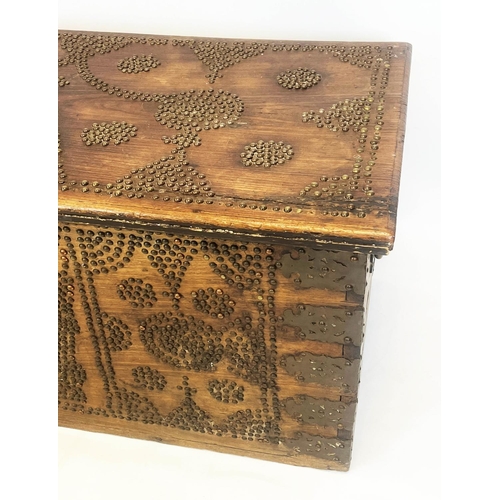 140 - ZANZIBAR TRUNK, 19th century hardwood and brass bound with rising lid, 57cm H x 116cm x 55cm.